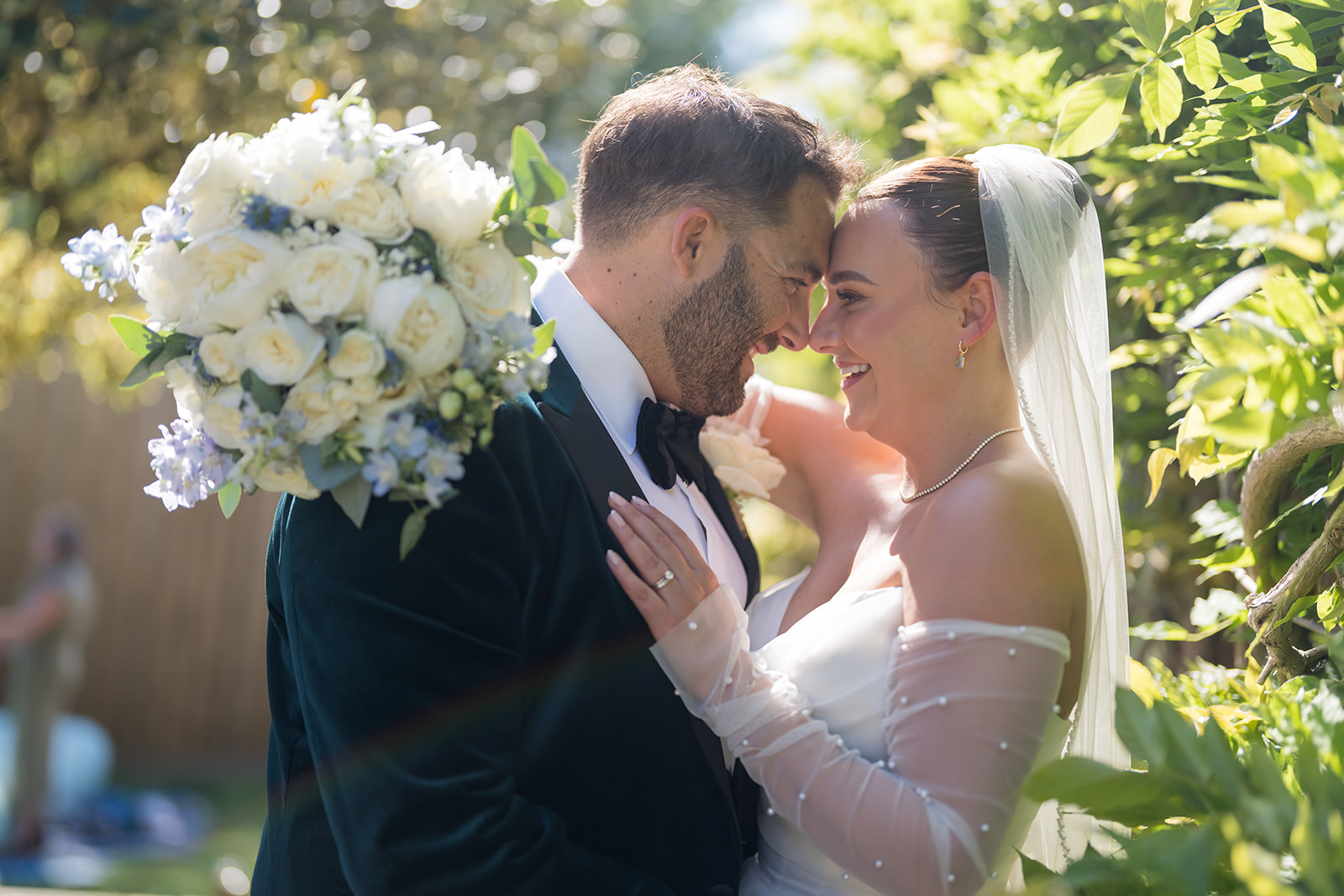 Lisa and Joe sharing a quiet portrait in the gardens at Rylands Farmhouse