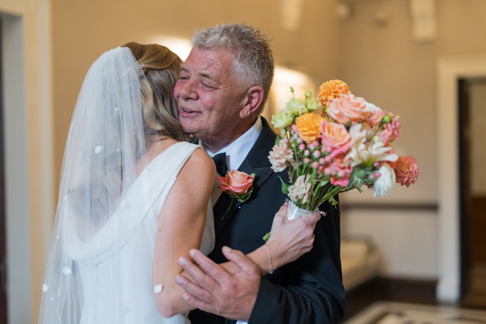 Amy embracing her father at Mottram Hall