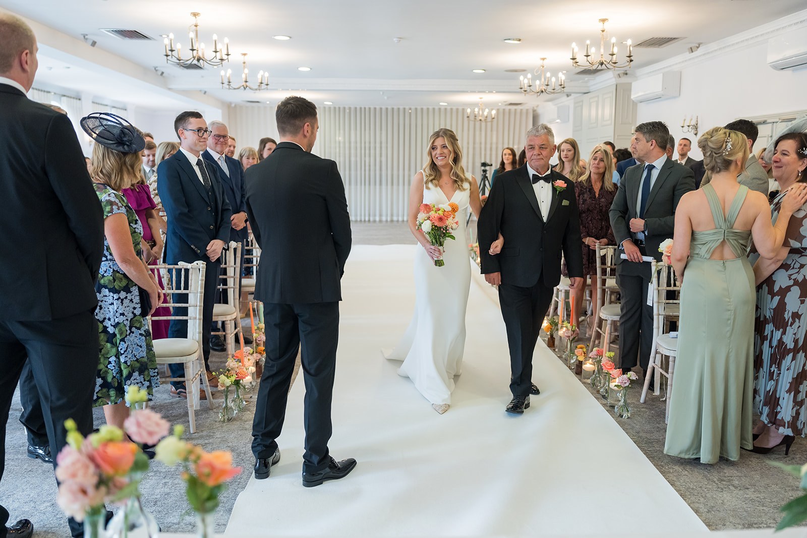 Amy walking down the aisle at Mottram Hall