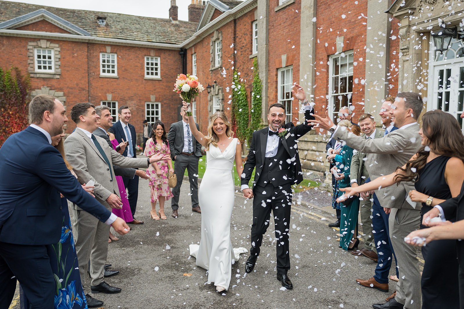 Confetti outside the hall at Mottram Hall