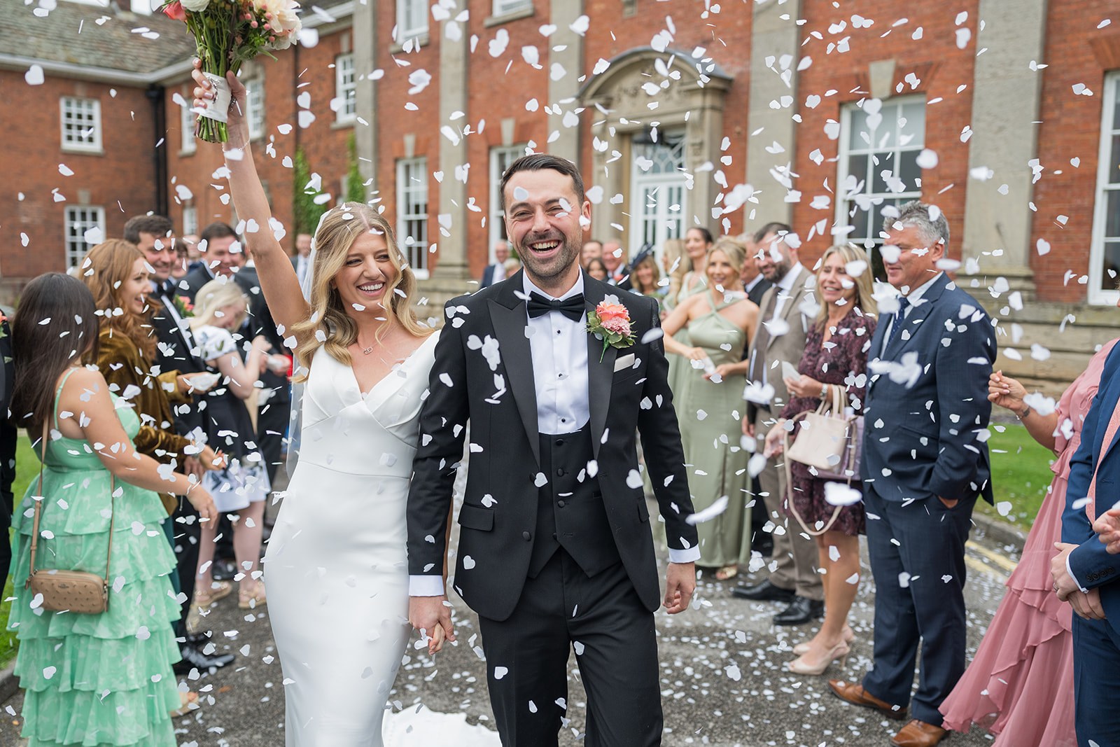 Confetti celebrations outside Mottram Hall