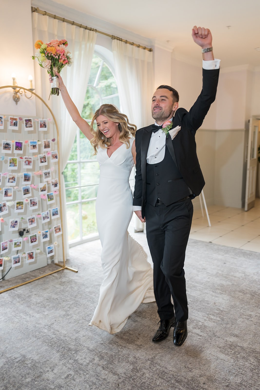 Entering the wedding breakfast at Mottram Hall