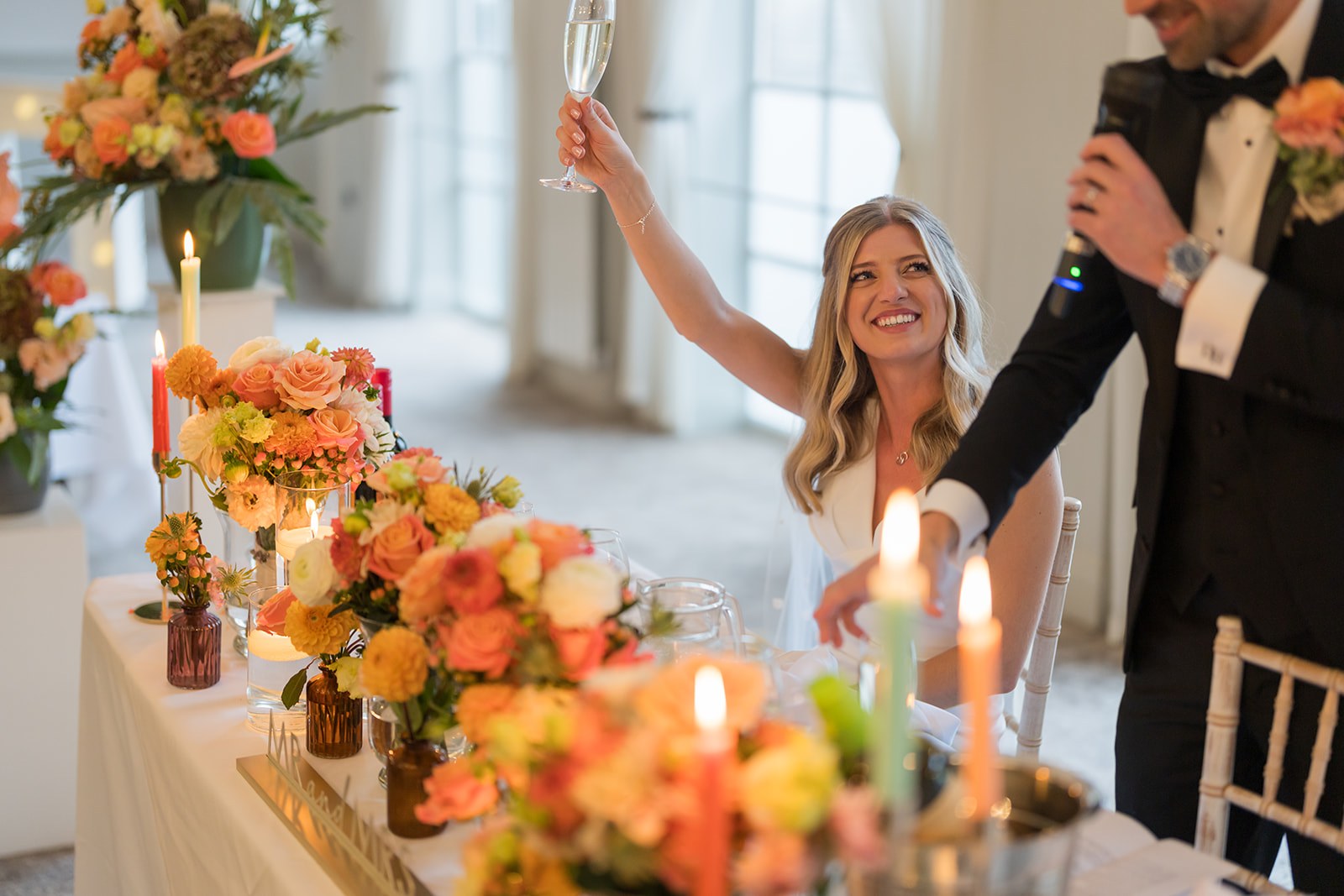 Amy laughing during the speeches at Mottram Hall