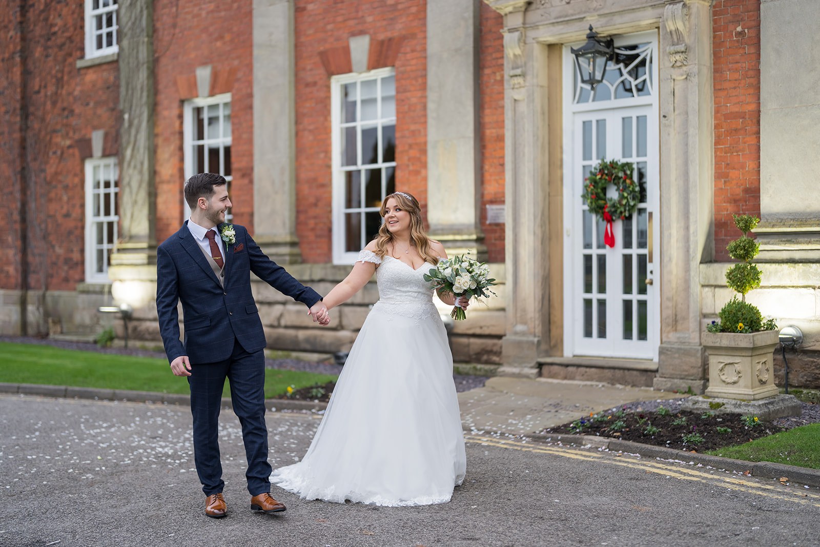 Emily and Rhys outside Mottram Hall