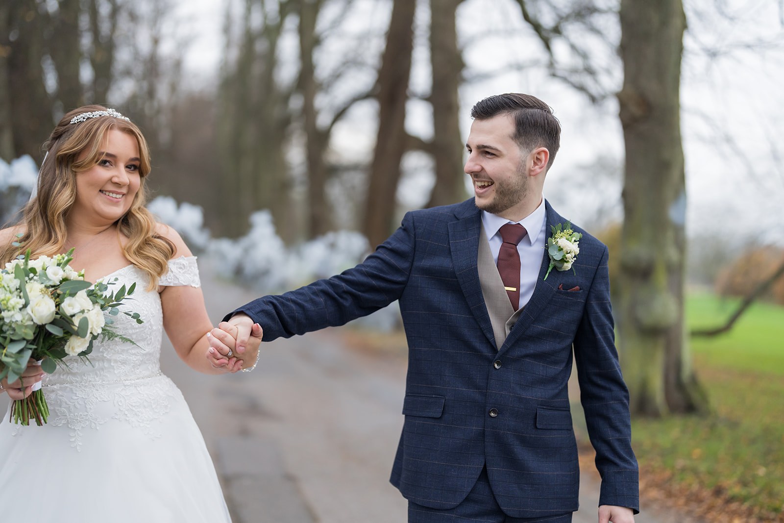 Emily and Rhys walking together at Mottram Hall