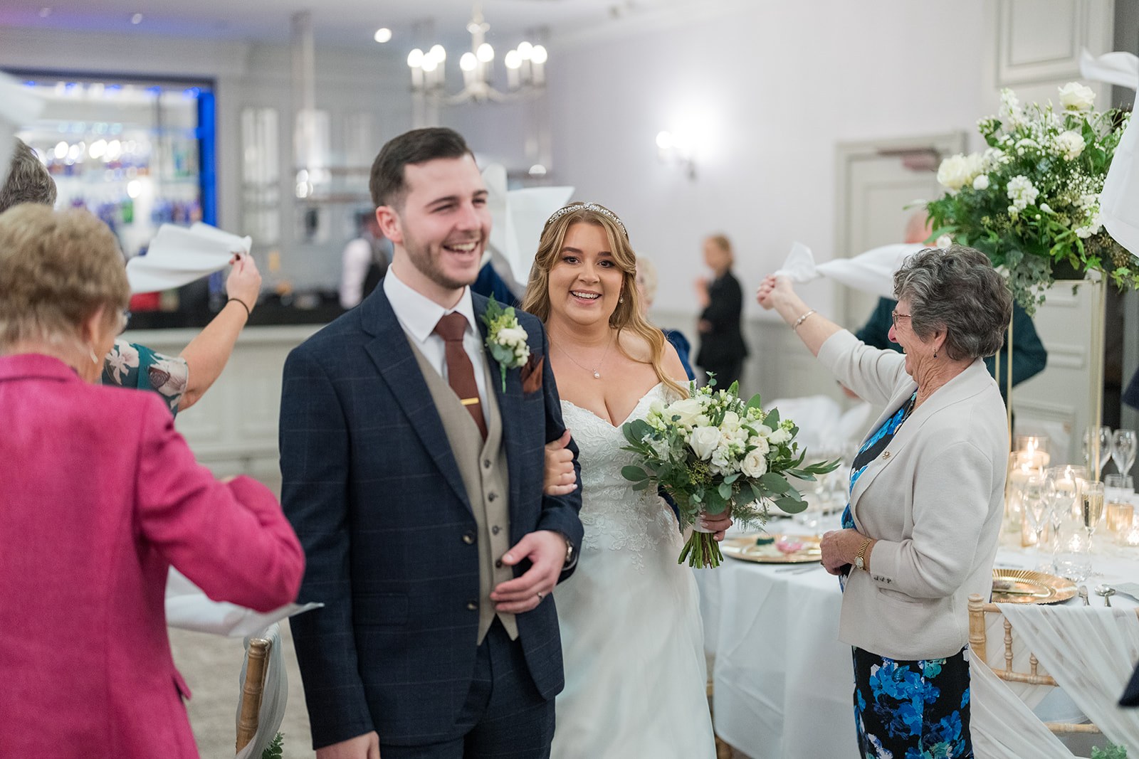 Guests welcoming the newlyweds at Mottram Hall