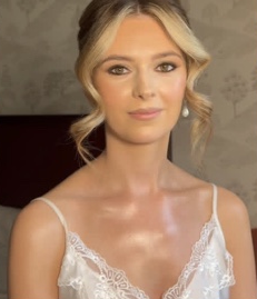 Soft face-framing bridal hairstyle from Hair by Natalie Jane’s portfolio