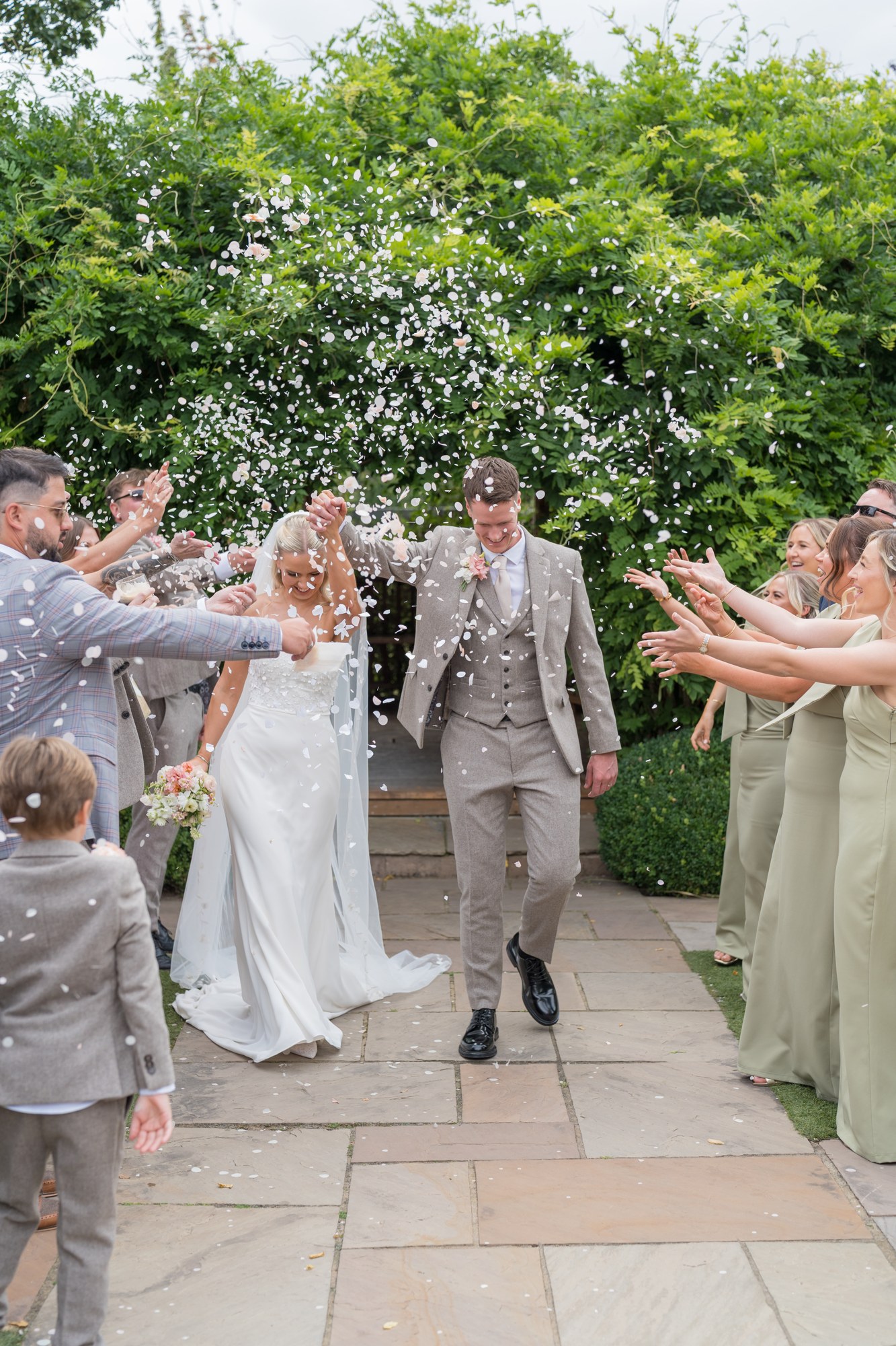 Guests throwing confetti at Pryors Hayes