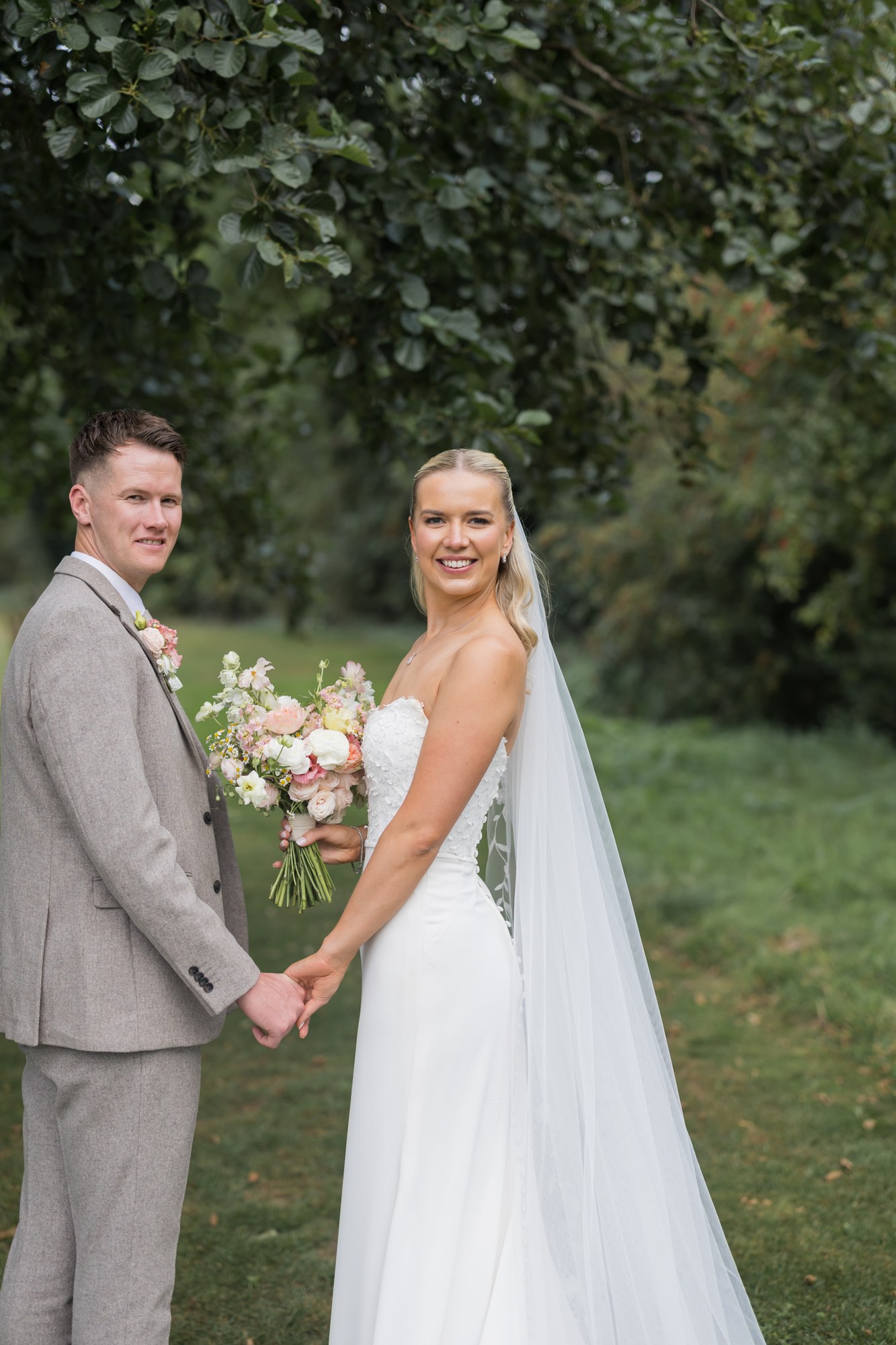 A relaxed portrait in the grounds at Pryors Hayes