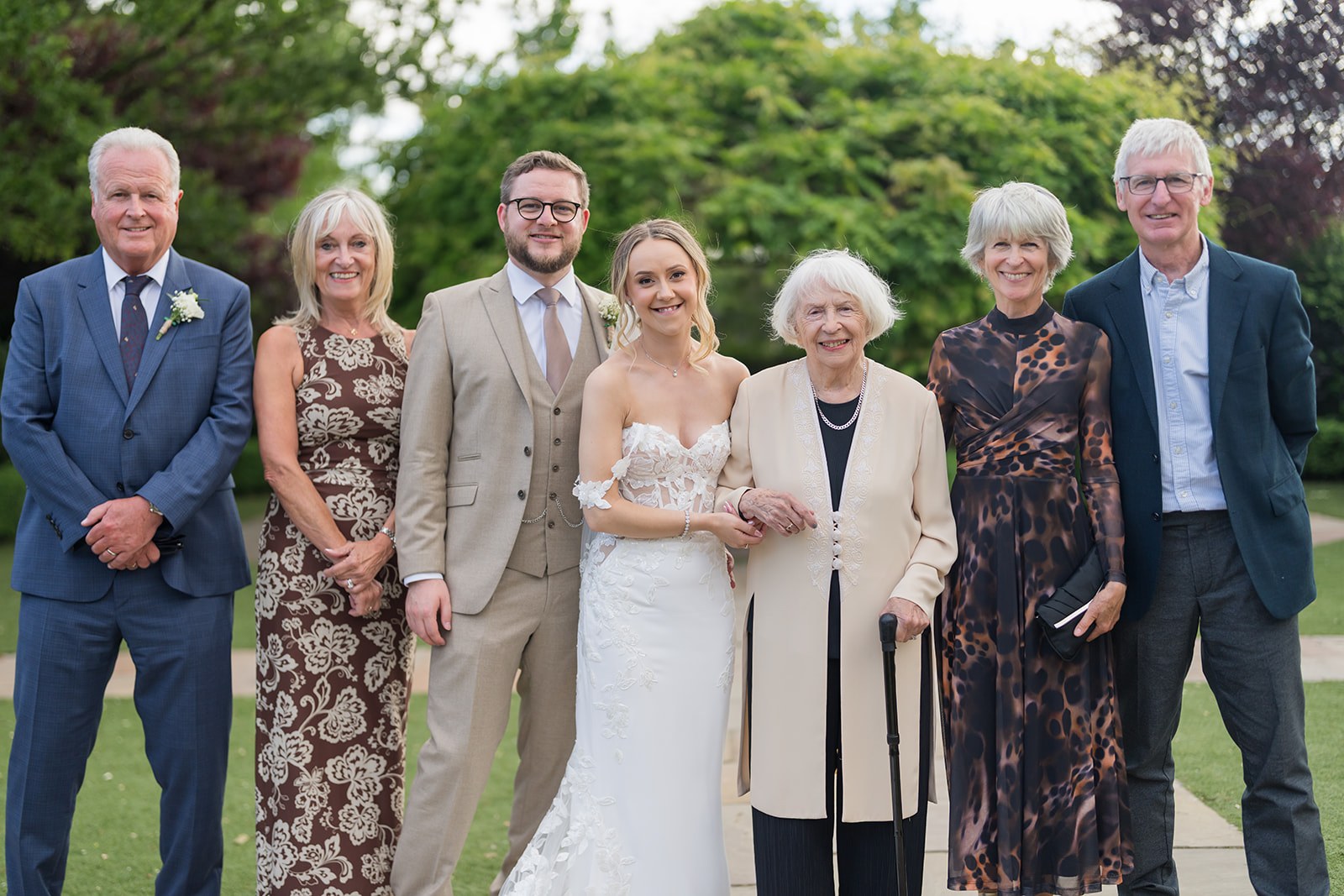 A relaxed family group photograph at Pryors Hayes