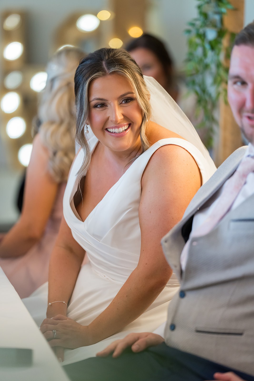 Mollie laughing during the reception at Pryors Hayes