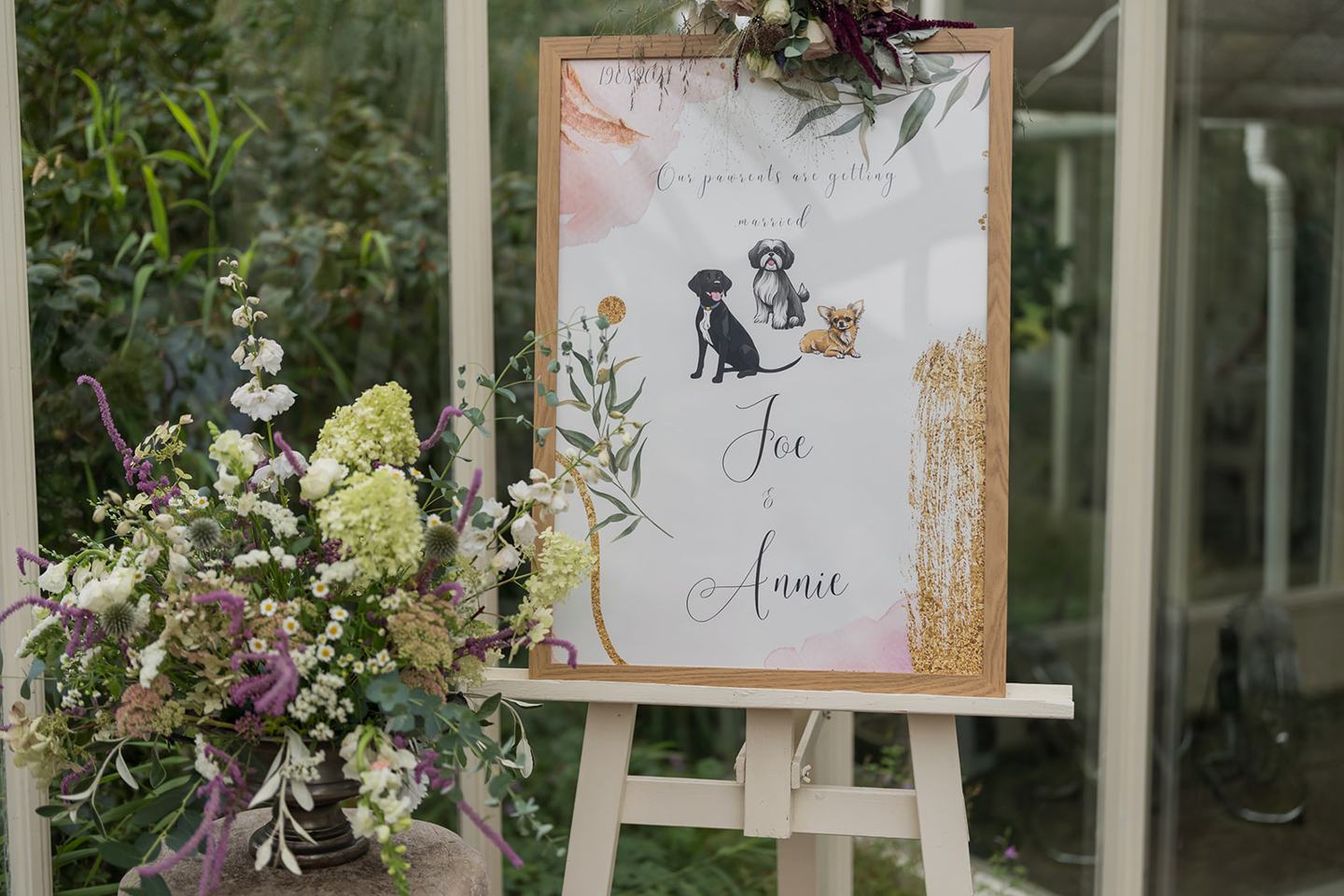 Welcome sign in the garden at Annie and Joe’s Abbeywood Estate wedding