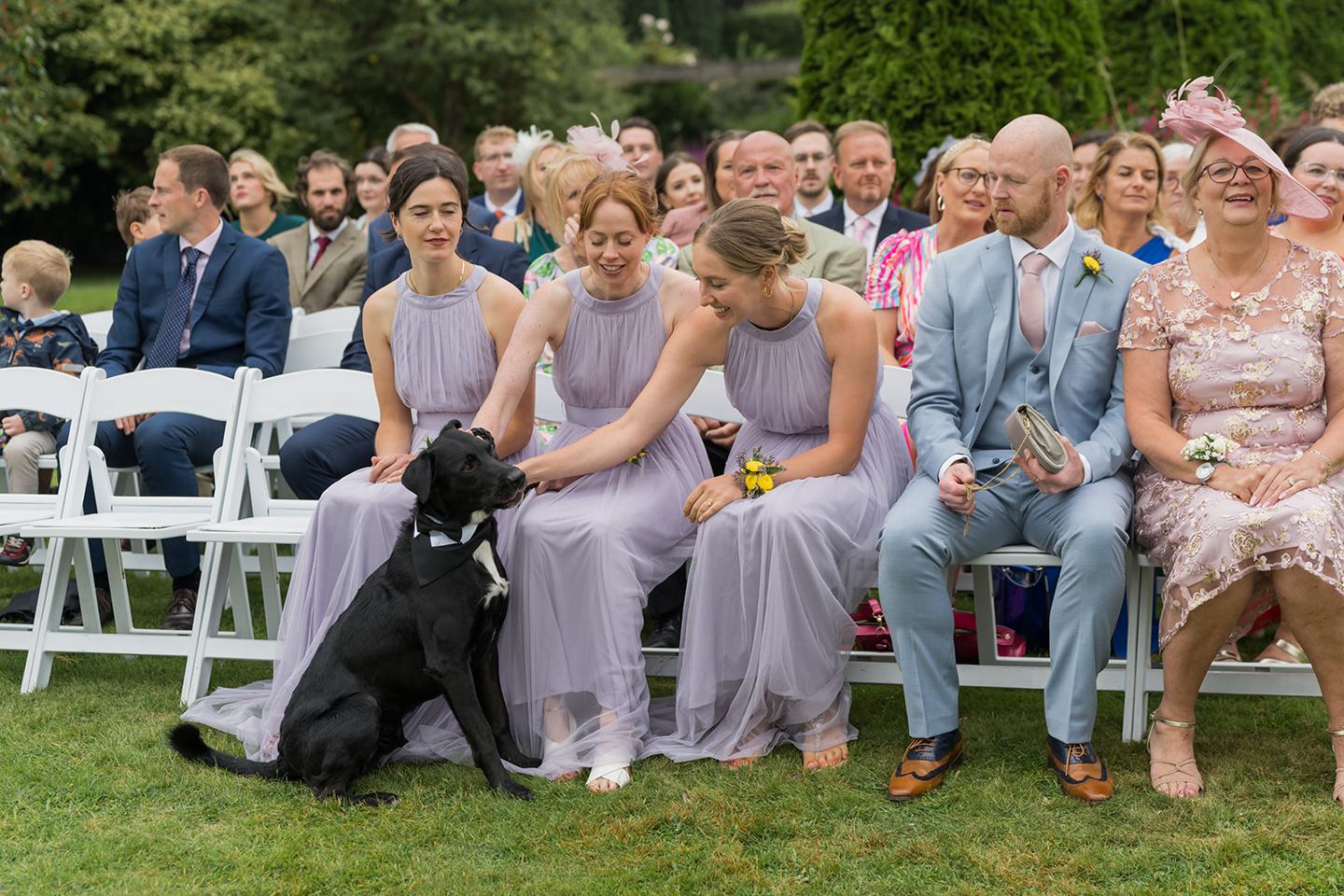 Guests watching the ceremony at Annie and Joe’s Abbeywood Estate wedding