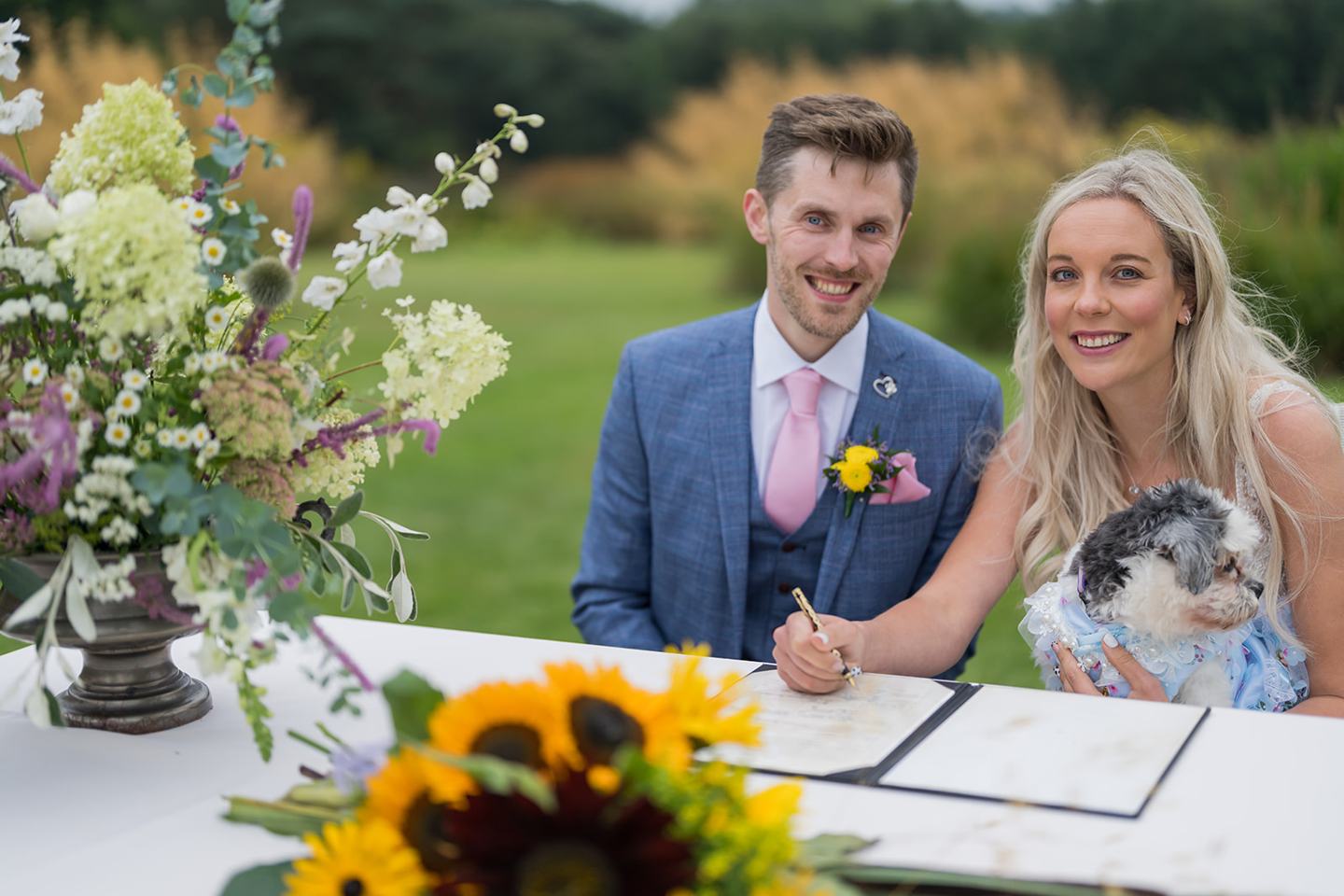 Signing the register at Annie and Joe’s Abbeywood Estate wedding