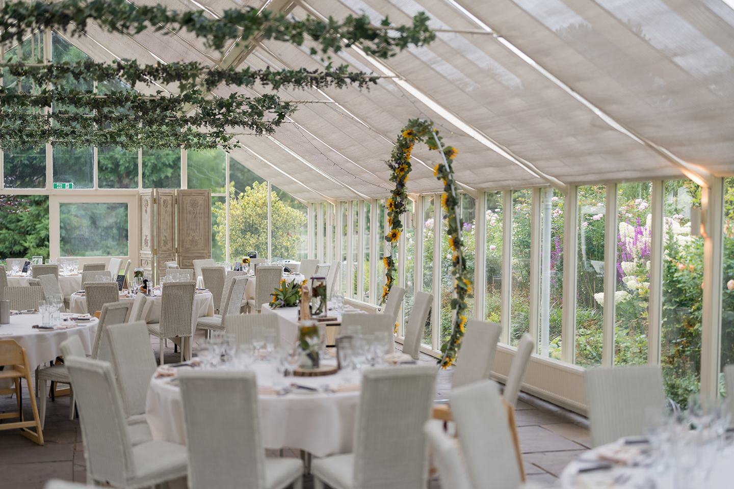 The glasshouse dressed for dinner at Annie and Joe’s Abbeywood Estate wedding