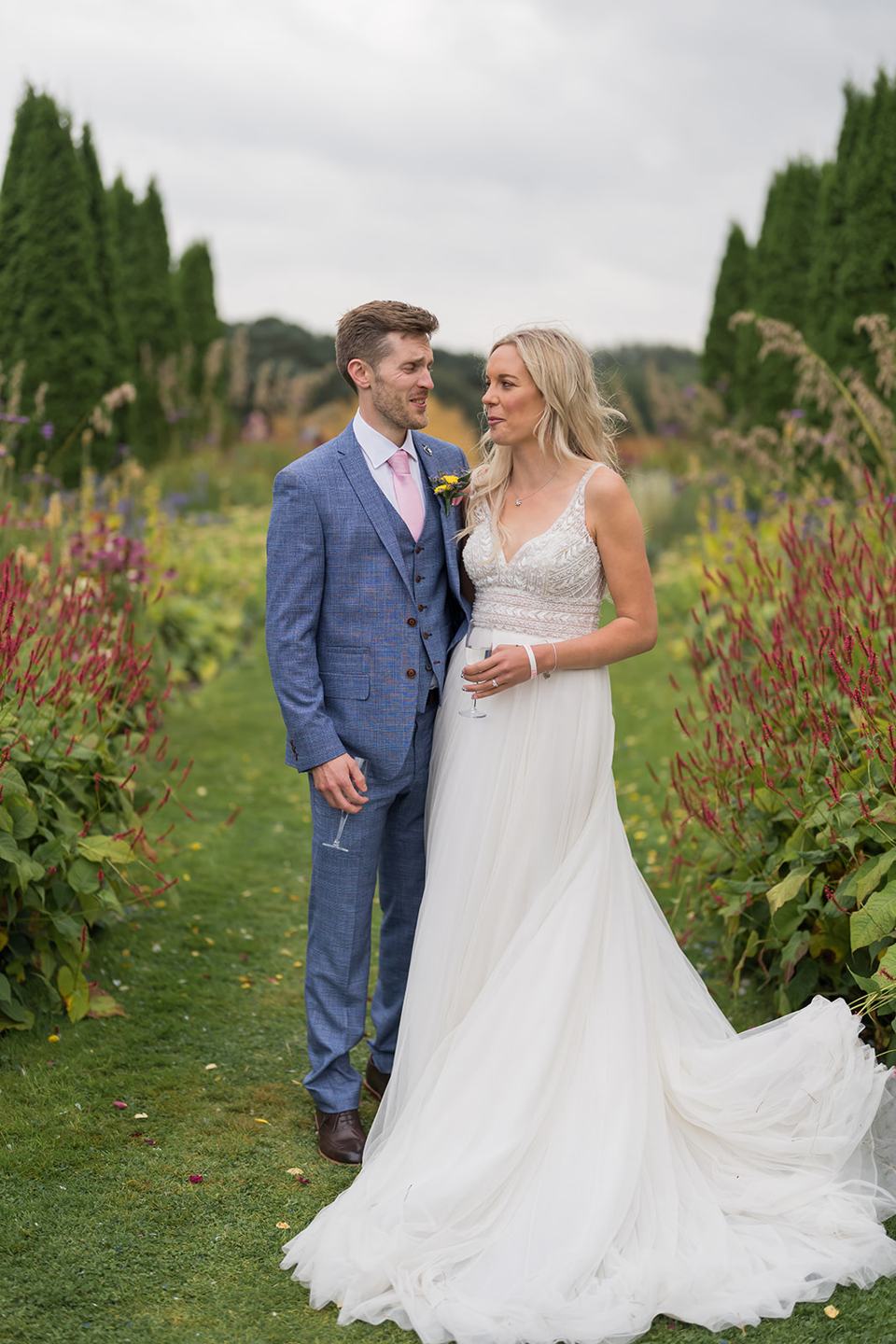 Portrait among the flowers at Annie and Joe’s Abbeywood Estate wedding