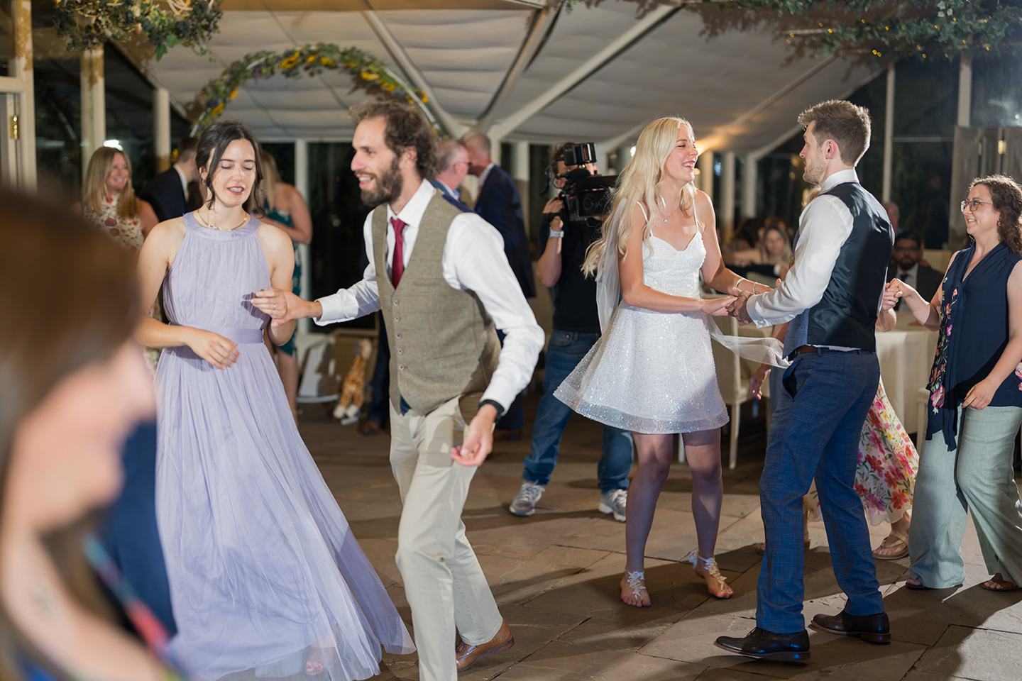 Guests on the dance floor at Annie and Joe’s Abbeywood Estate wedding