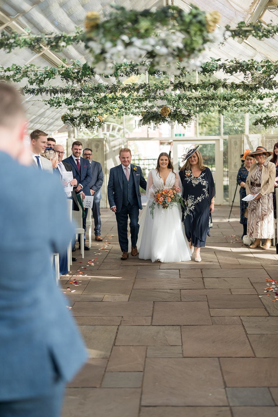 Walking into the ceremony at Gemma and James’s Abbeywood Estate wedding