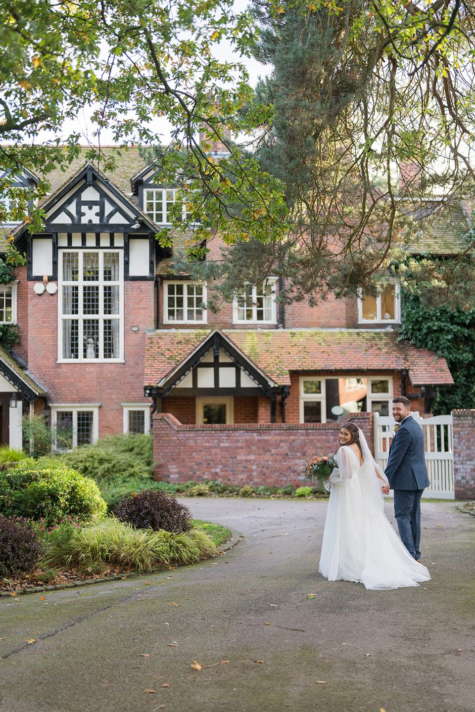 Portrait outside the house at Gemma and James’s Abbeywood Estate wedding