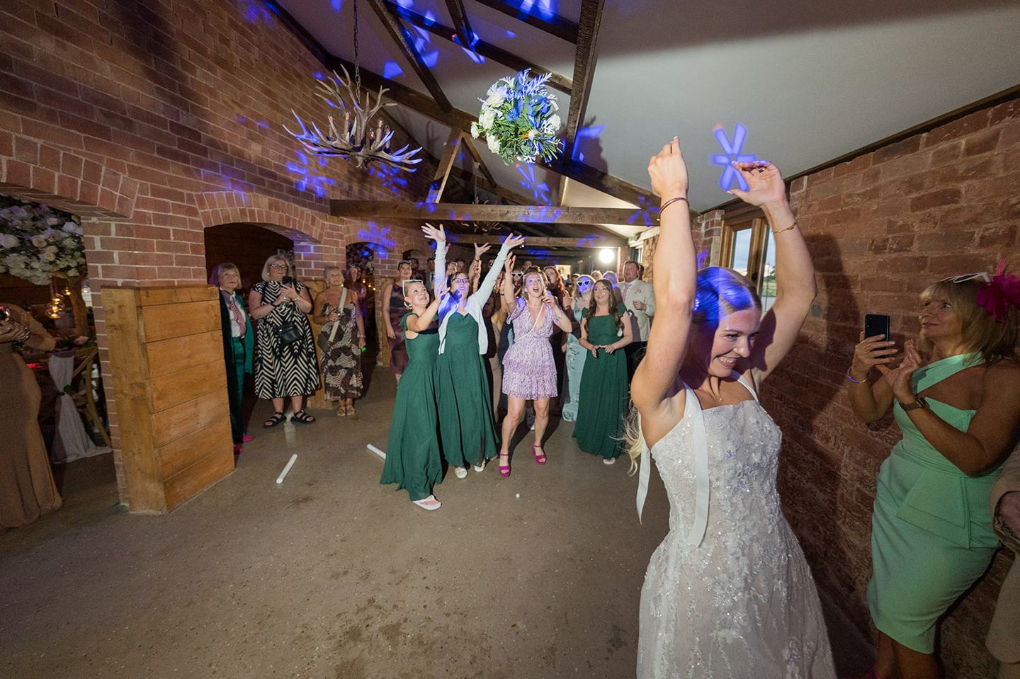 Evening dance floor celebrations at Evie and Josh’s Burlton Manor wedding