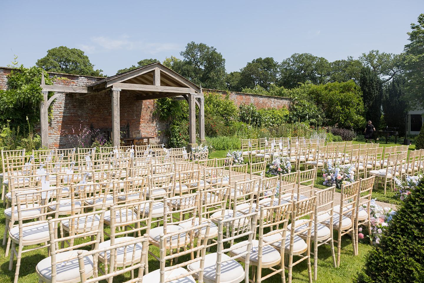 Outdoor wedding ceremony setting at Abi and Ben’s Combermere Abbey wedding