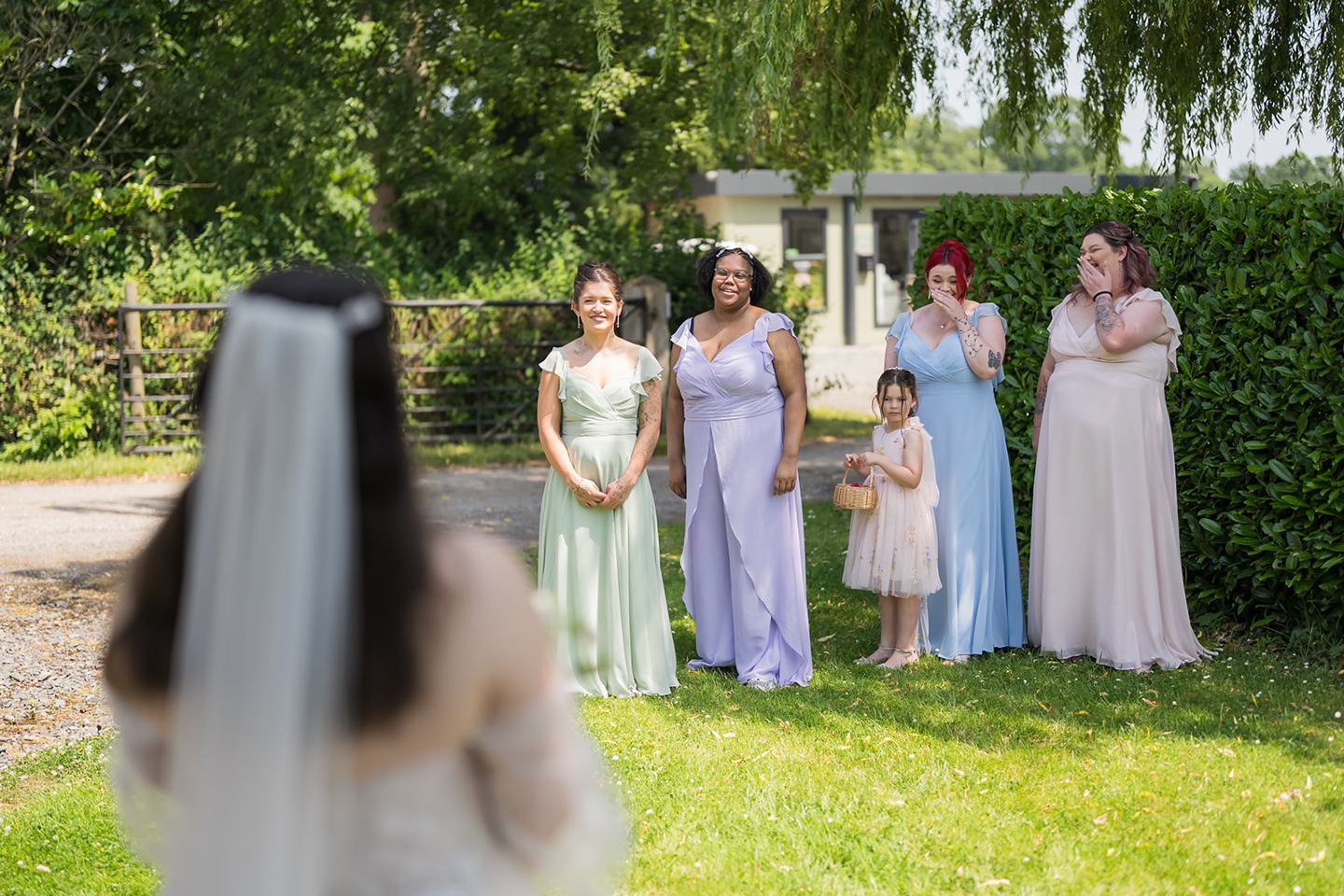 Bride with her bridesmaids at Abi and Ben’s Combermere Abbey wedding