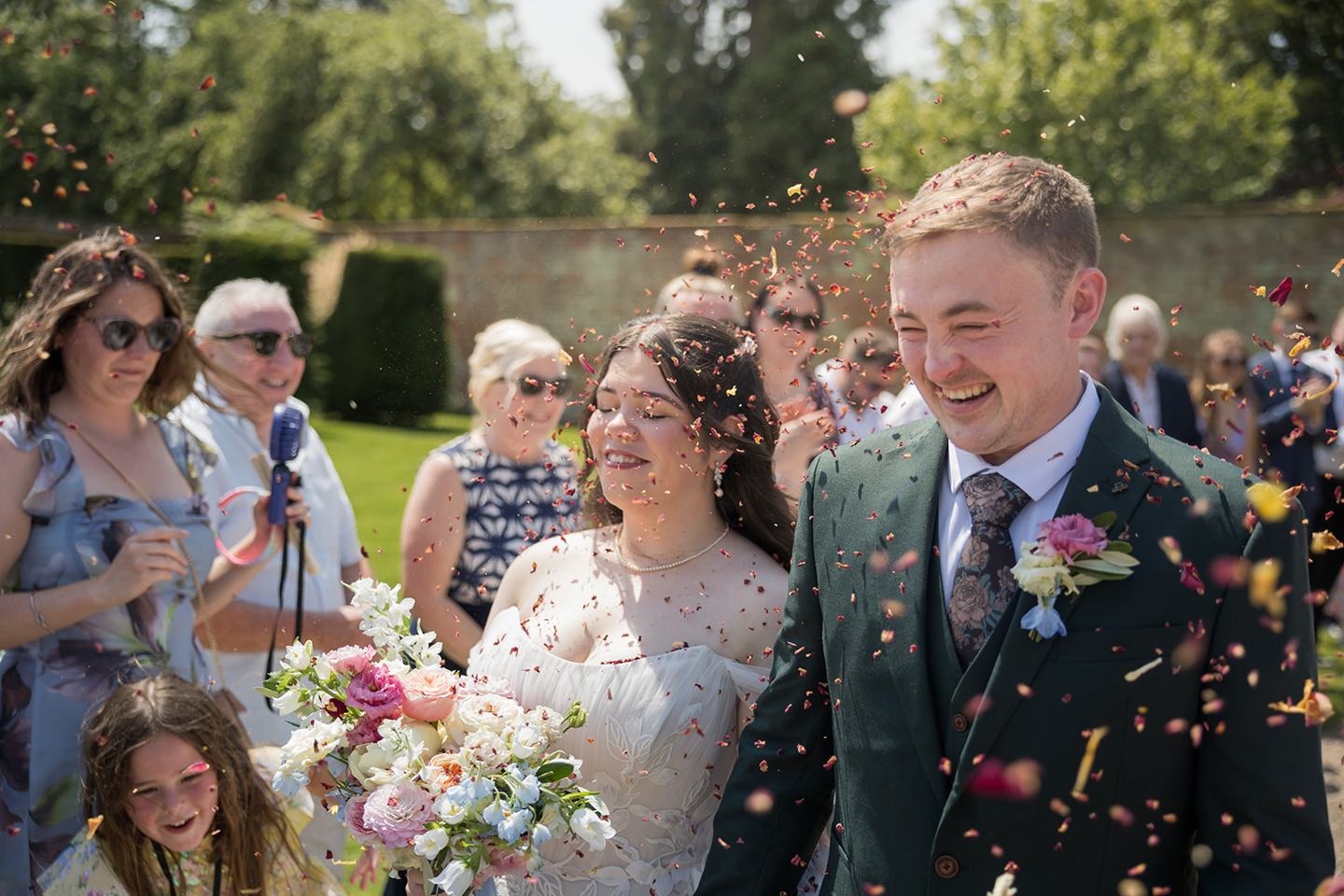 Confetti in the walled garden at Abi and Ben’s Combermere Abbey wedding