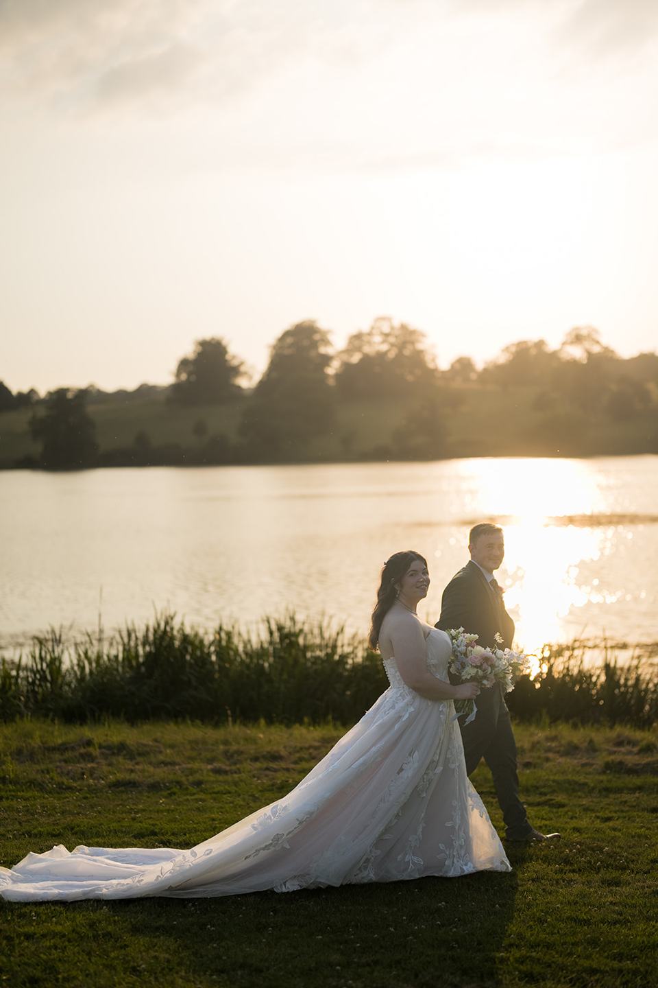 Sunset portrait beside the lake at Abi and Ben’s Combermere Abbey wedding