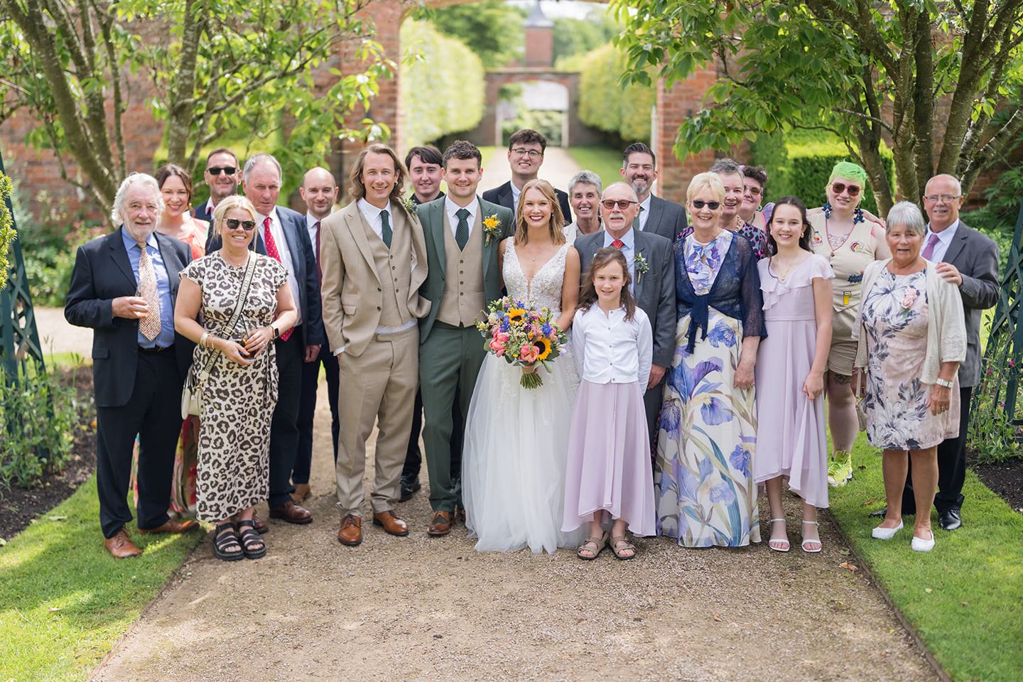 Family photographs in the walled garden at Hannah and Jacob’s Combermere Abbey wedding