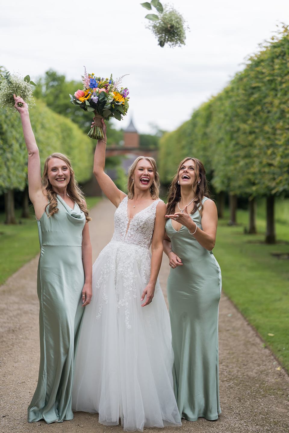 Bride with her bridesmaids at Hannah and Jacob’s Combermere Abbey wedding