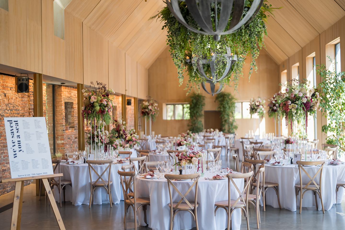 The wedding breakfast room at Lauren and Tom’s Dorfold Hall wedding