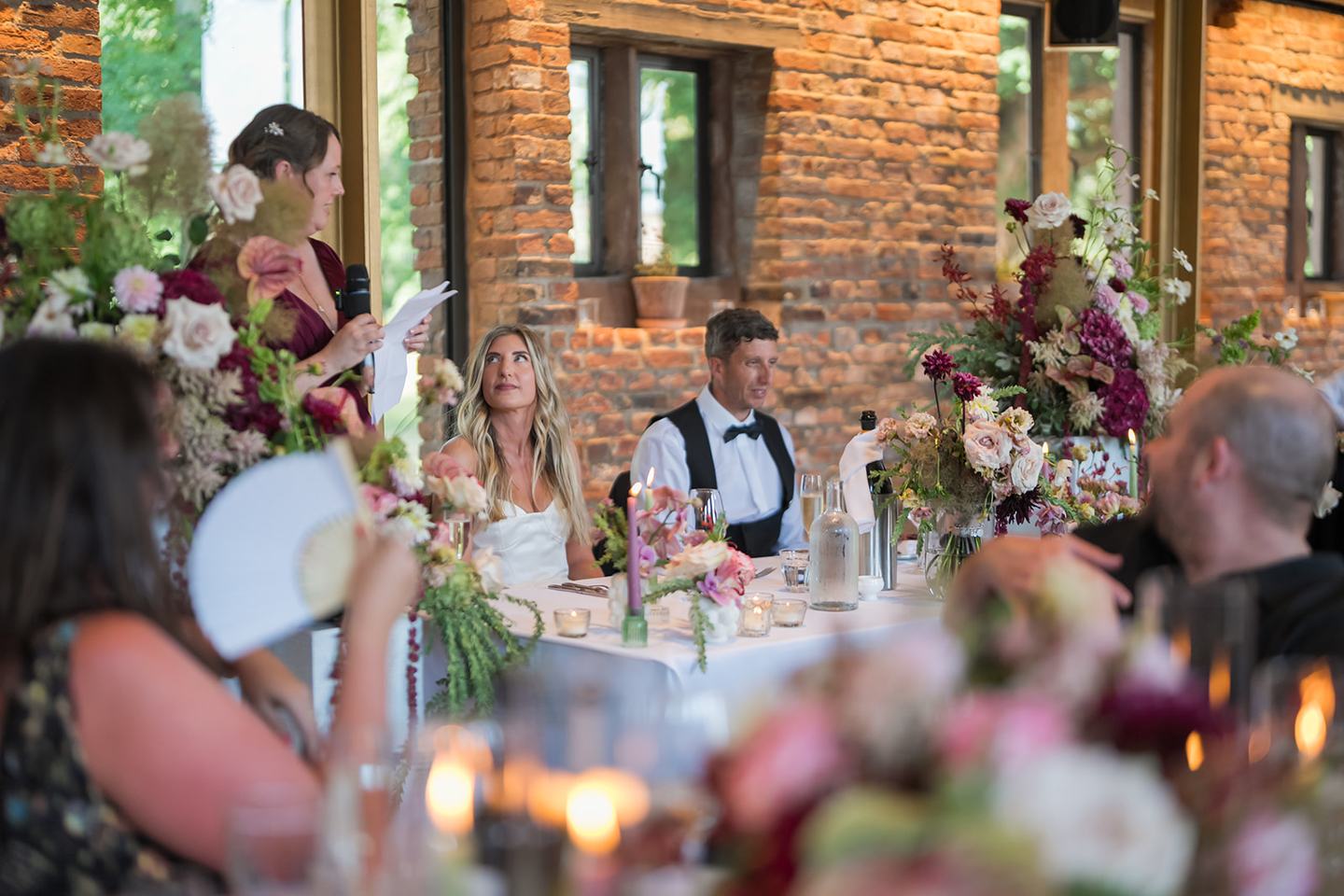 Laughter during speeches at Lauren and Tom’s Dorfold Hall wedding
