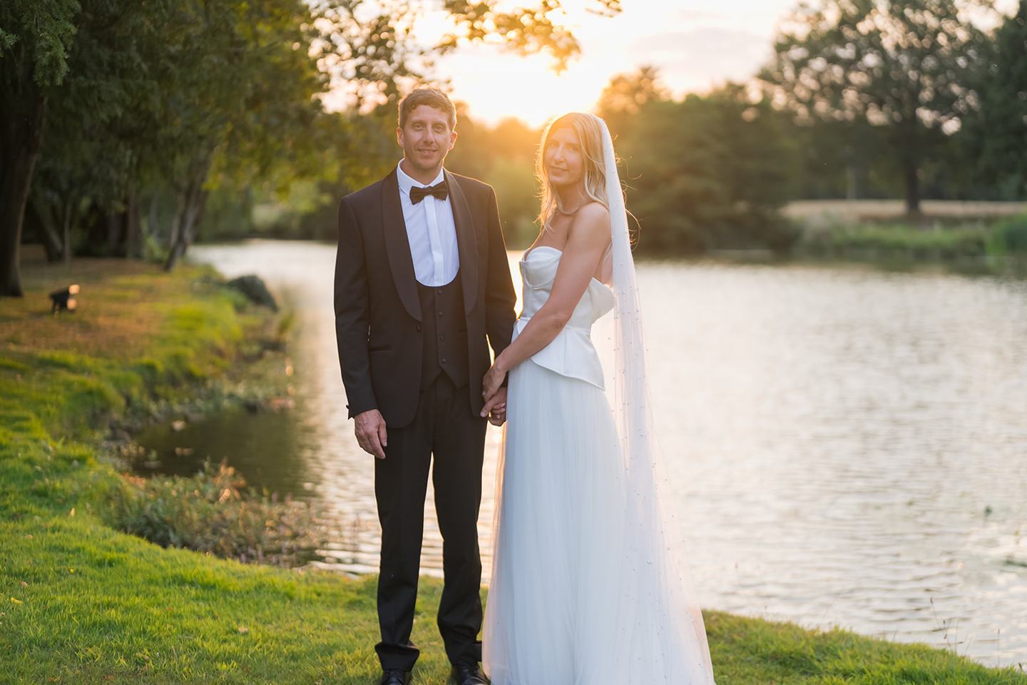 Evening portraits beside the lake at Lauren and Tom’s Dorfold Hall wedding