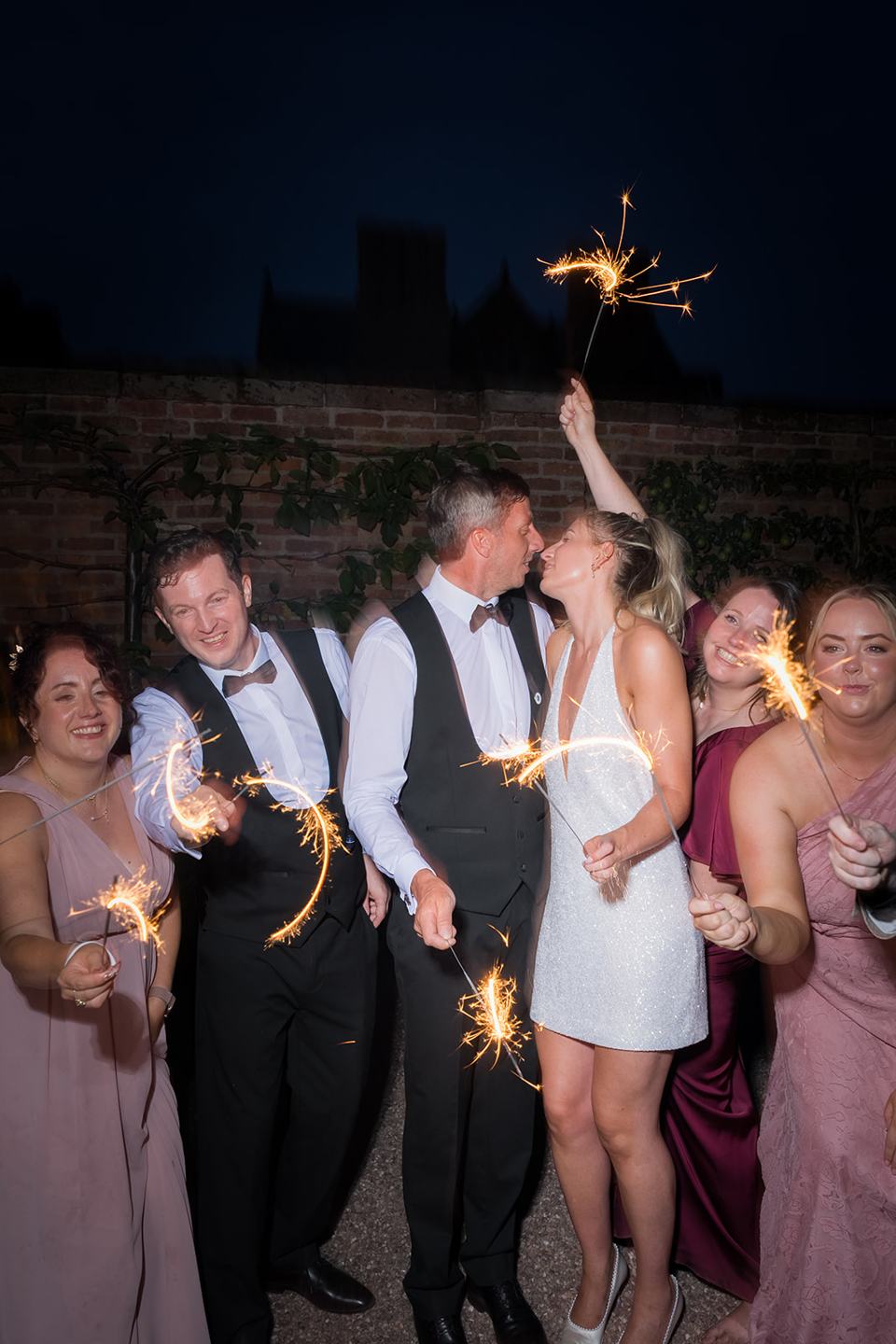 Evening sparklers at Lauren and Tom’s Dorfold Hall wedding