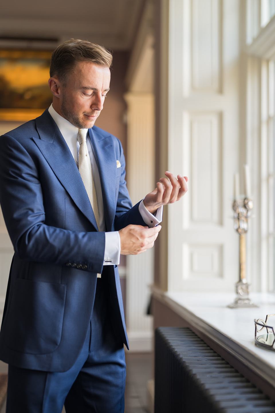 Groom getting ready at Lizzie and Jack’s Dorfold Hall wedding