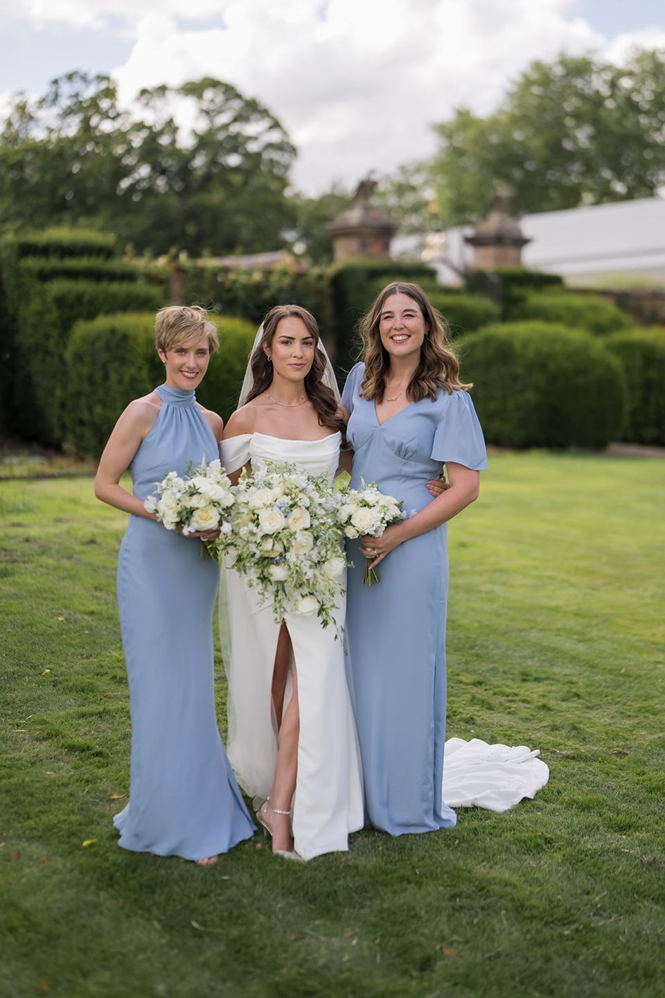 Bridesmaids in the gardens at Lizzie and Jack’s Dorfold Hall wedding