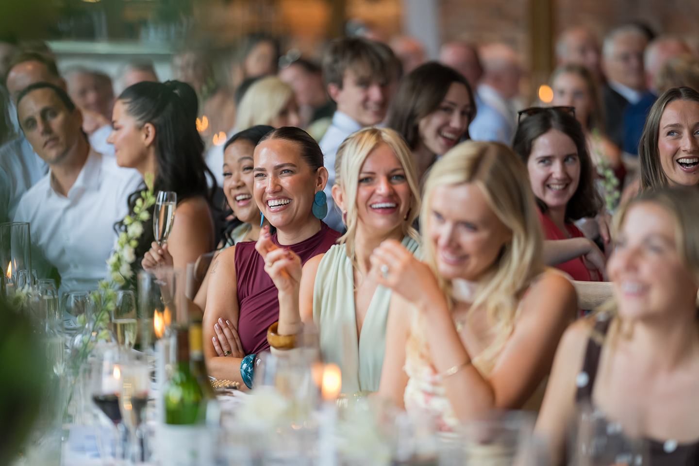 Laughter during speeches at Lizzie and Jack’s Dorfold Hall wedding