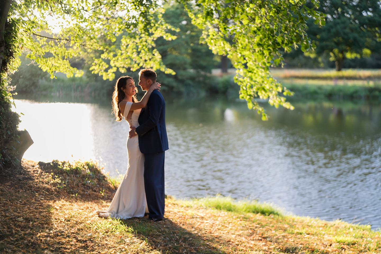 Portrait beside the lake at Lizzie and Jack’s Dorfold Hall wedding