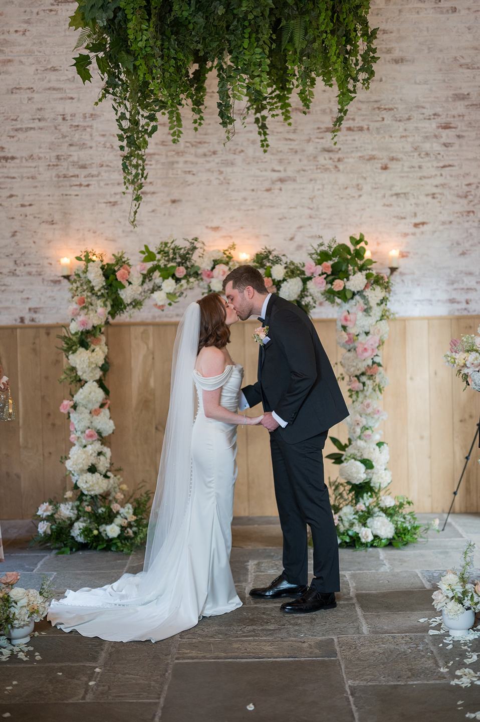 The first kiss at Louise and Ben’s Dorfold Hall wedding