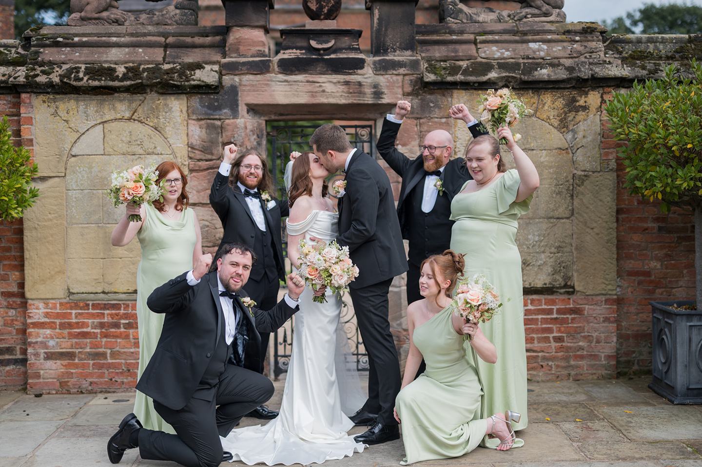 Wedding party together at Louise and Ben’s Dorfold Hall wedding