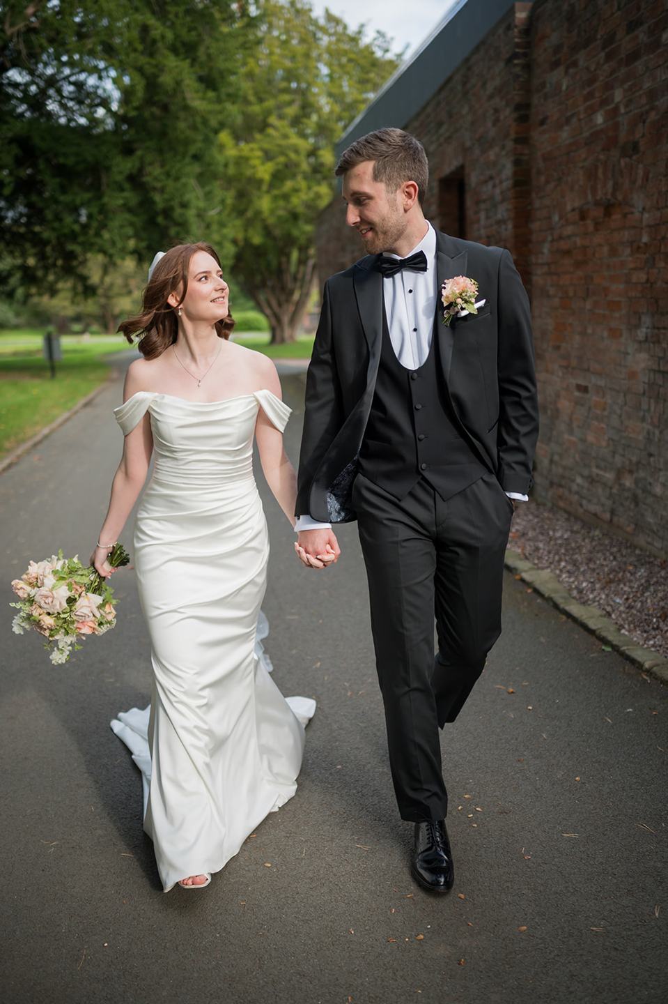 Walking through the grounds at Louise and Ben’s Dorfold Hall wedding