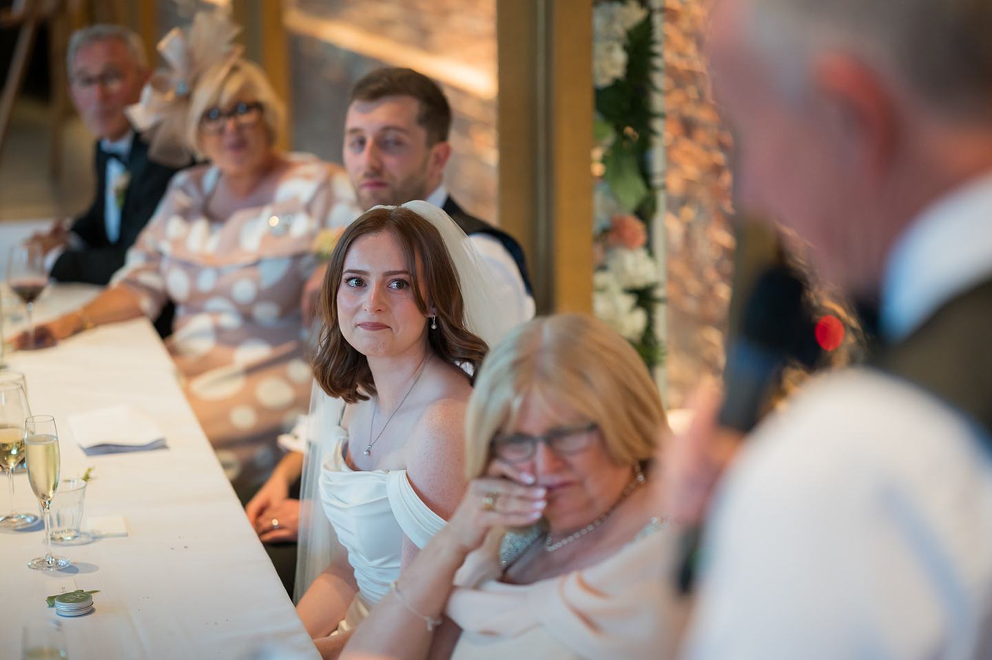 Reactions during speeches at Louise and Ben’s Dorfold Hall wedding
