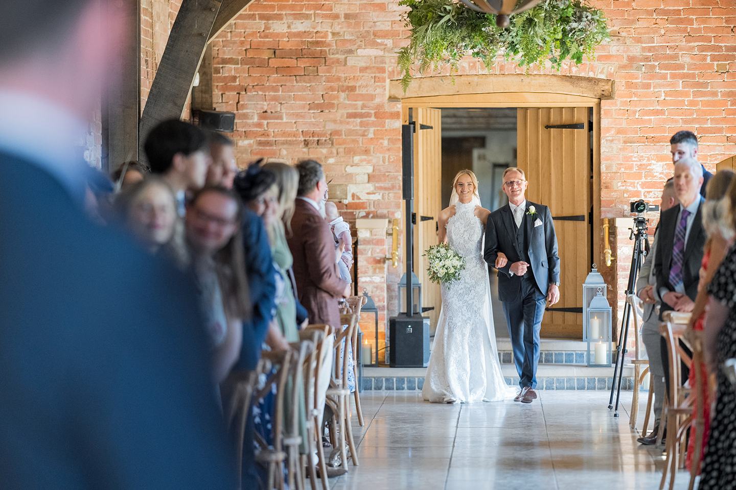Bride arriving for the ceremony at Emma and Jack’s Grangefields wedding