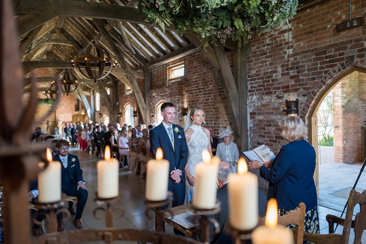 Wedding ceremony in the barn at Emma and Jack’s Grangefields wedding