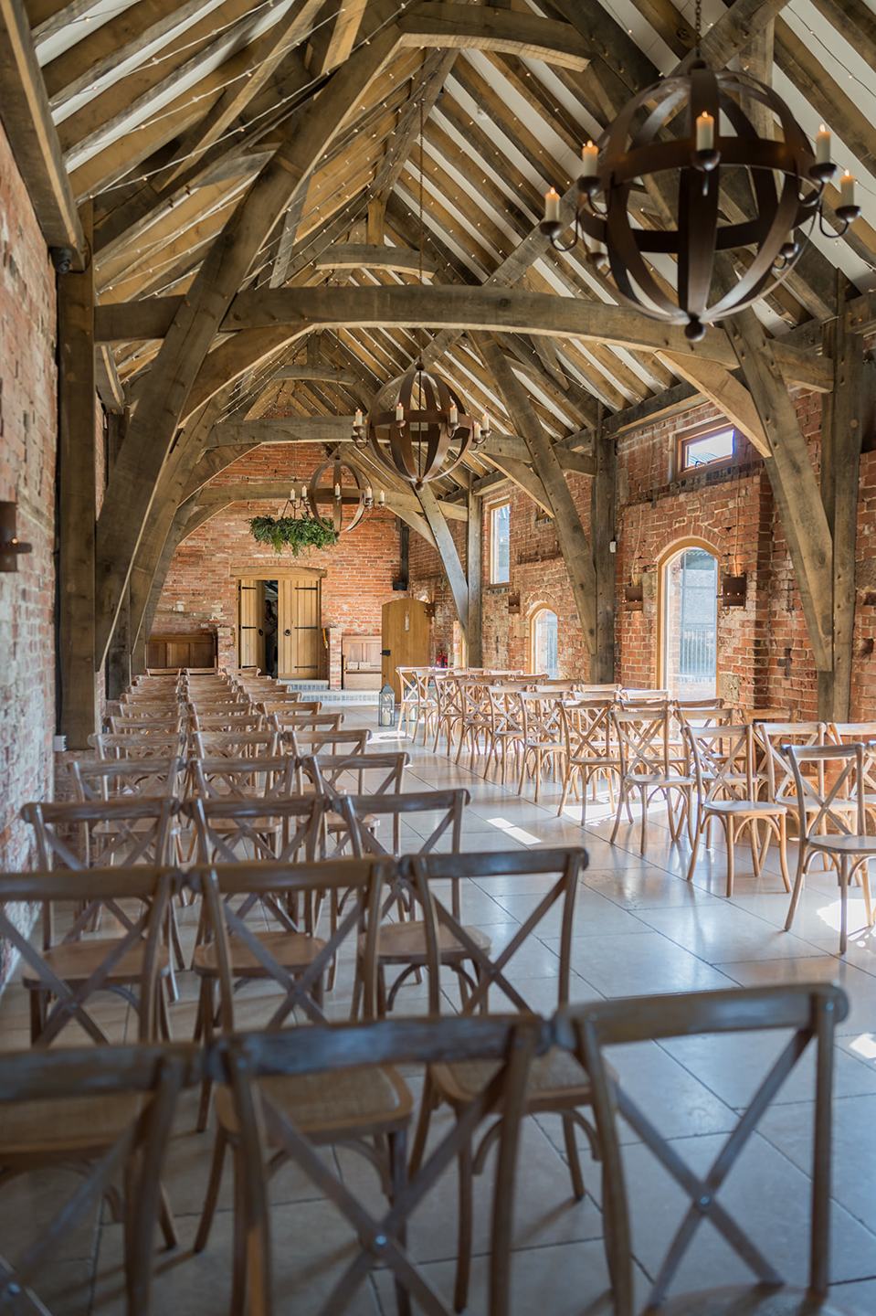Rustic ceremony barn at Georgie and Matt’s Grangefields wedding