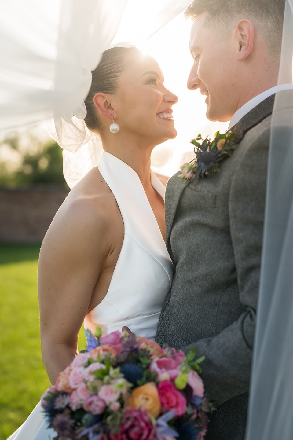 Golden hour couple portrait at Georgie and Matt’s Grangefields wedding