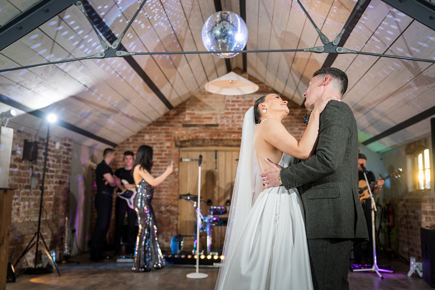 First dance beneath the barn roof at Georgie and Matt’s Grangefields wedding