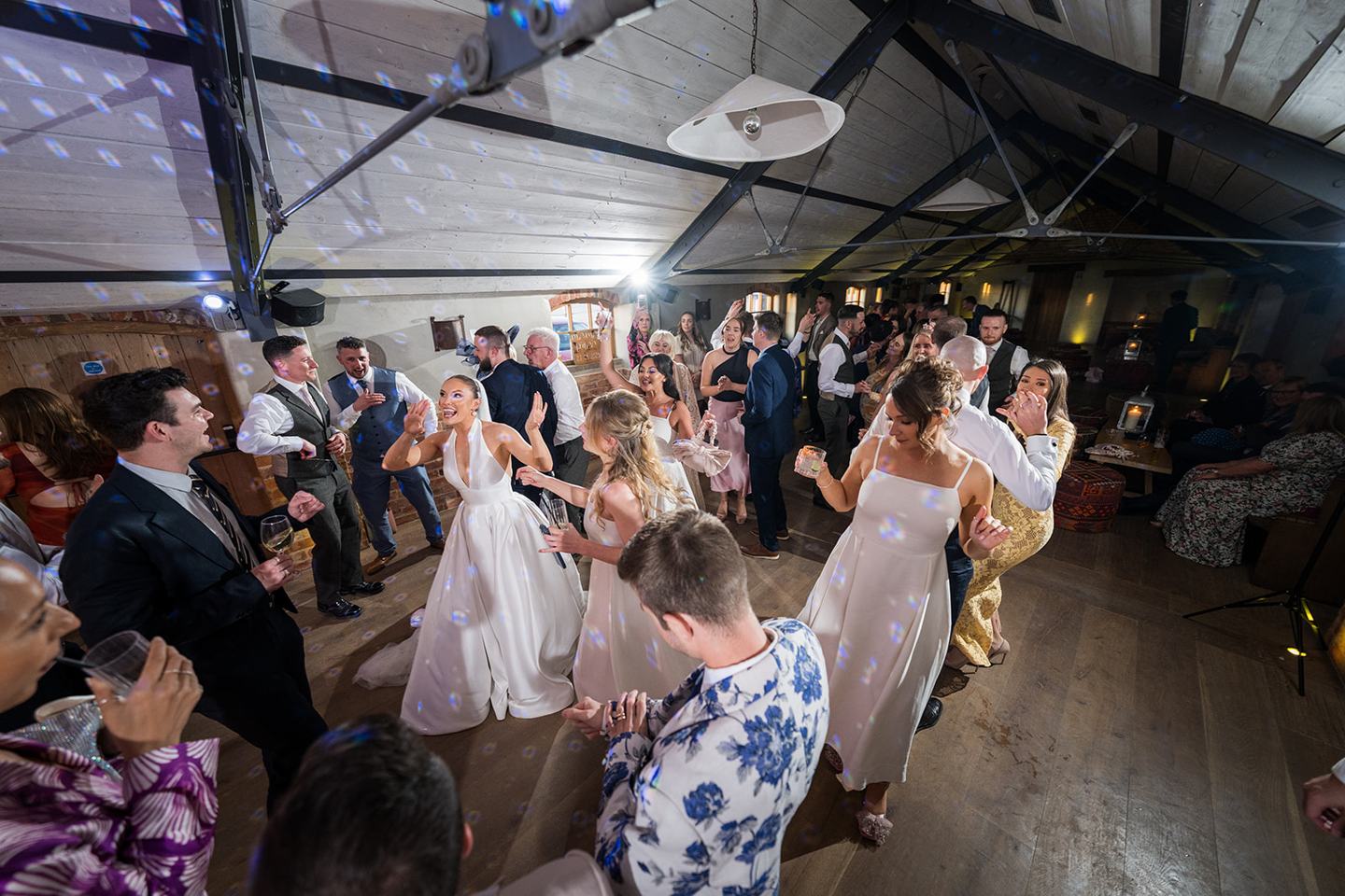 Evening dance floor celebrations at Georgie and Matt’s Grangefields wedding