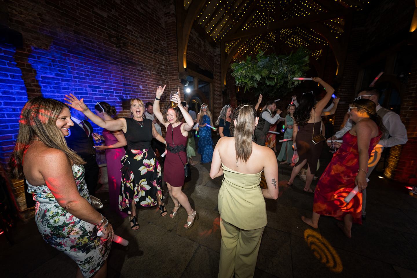 Guests on the dance floor at Chloe and Wilson’s Hazel Gap Barn wedding