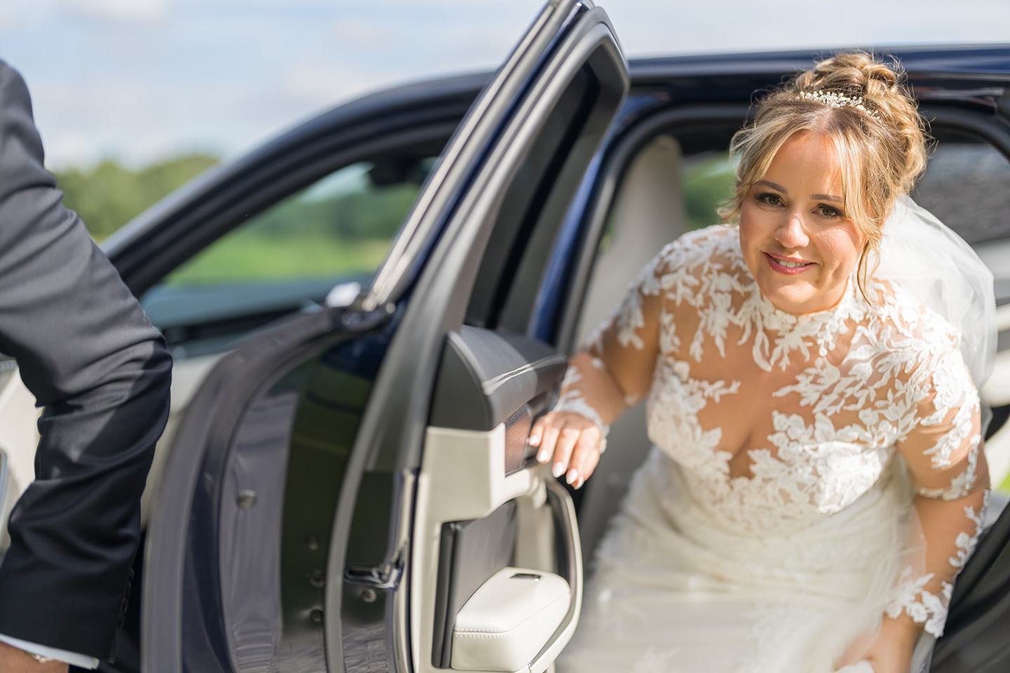 Bride arriving at the venue at Emma and Sam’s Hazel Gap Barn wedding
